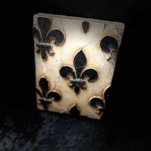 Sid Dickens tile that is retired